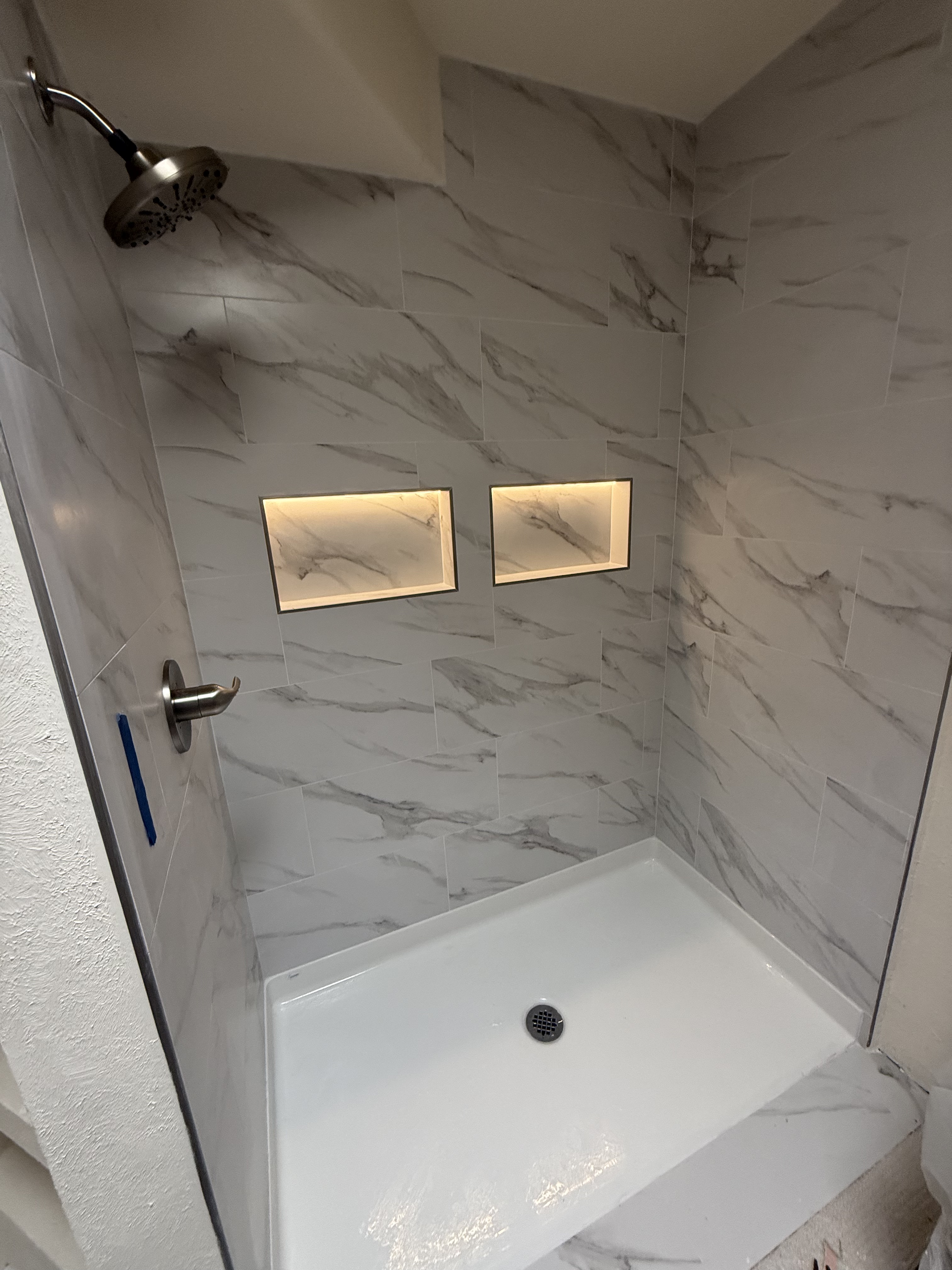 Barrier-free walk-in shower with lighted niche's completed by KRCS in Albuquerque