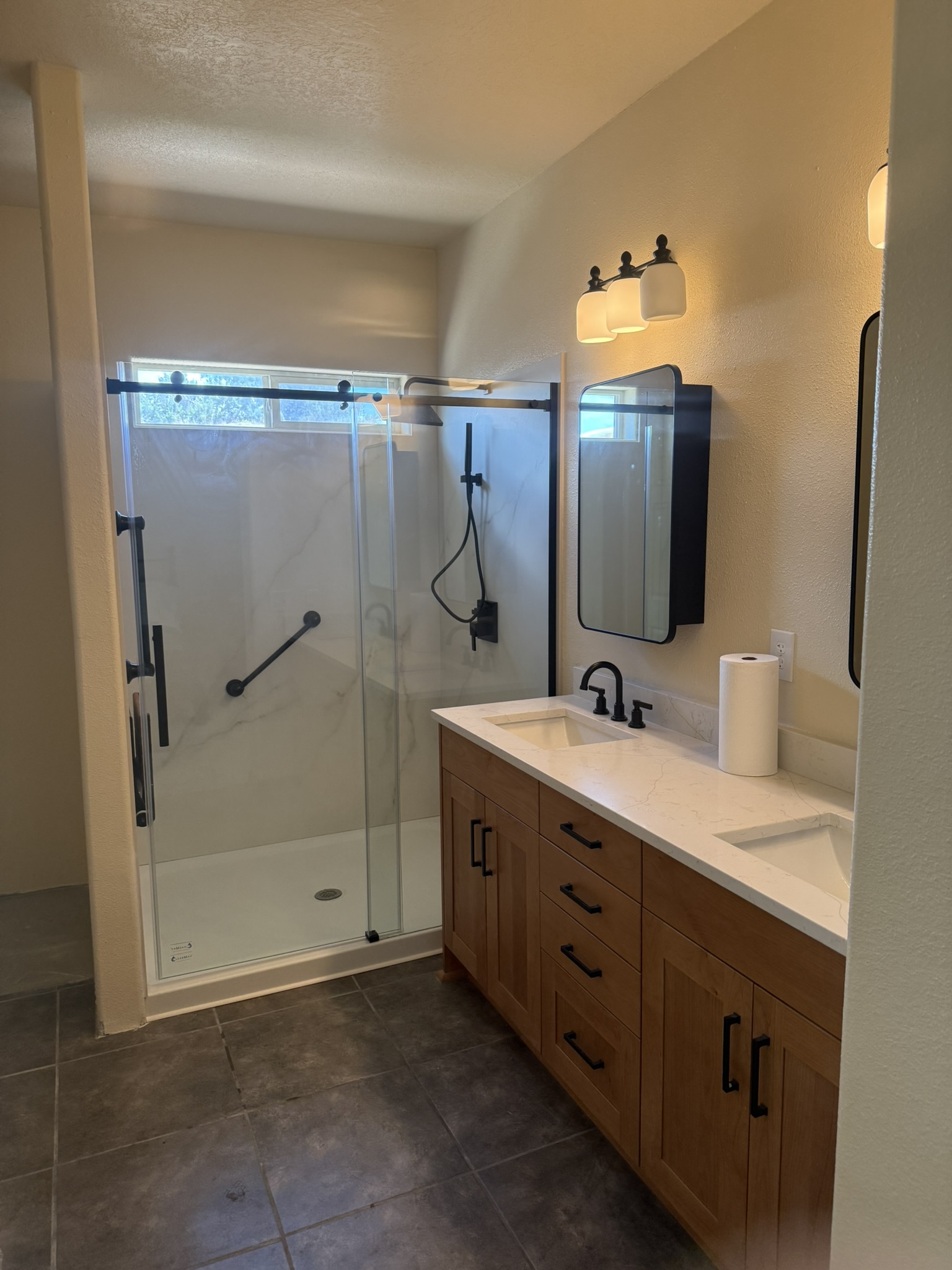 Walk-in shower with porcelain surround in Santa Fe home