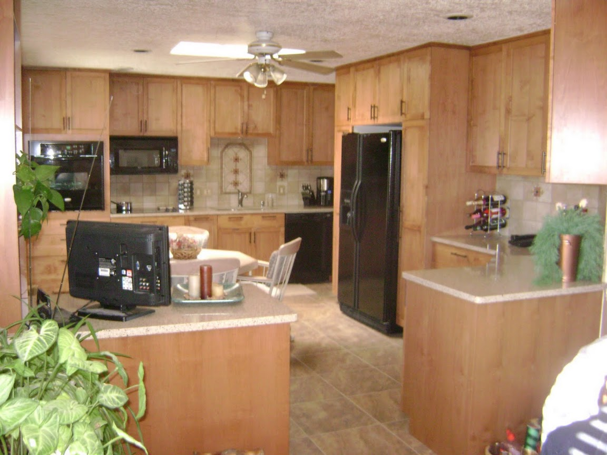 Frameless alder cabinetry and granite countertops completed by KRCS in Rio Rancho