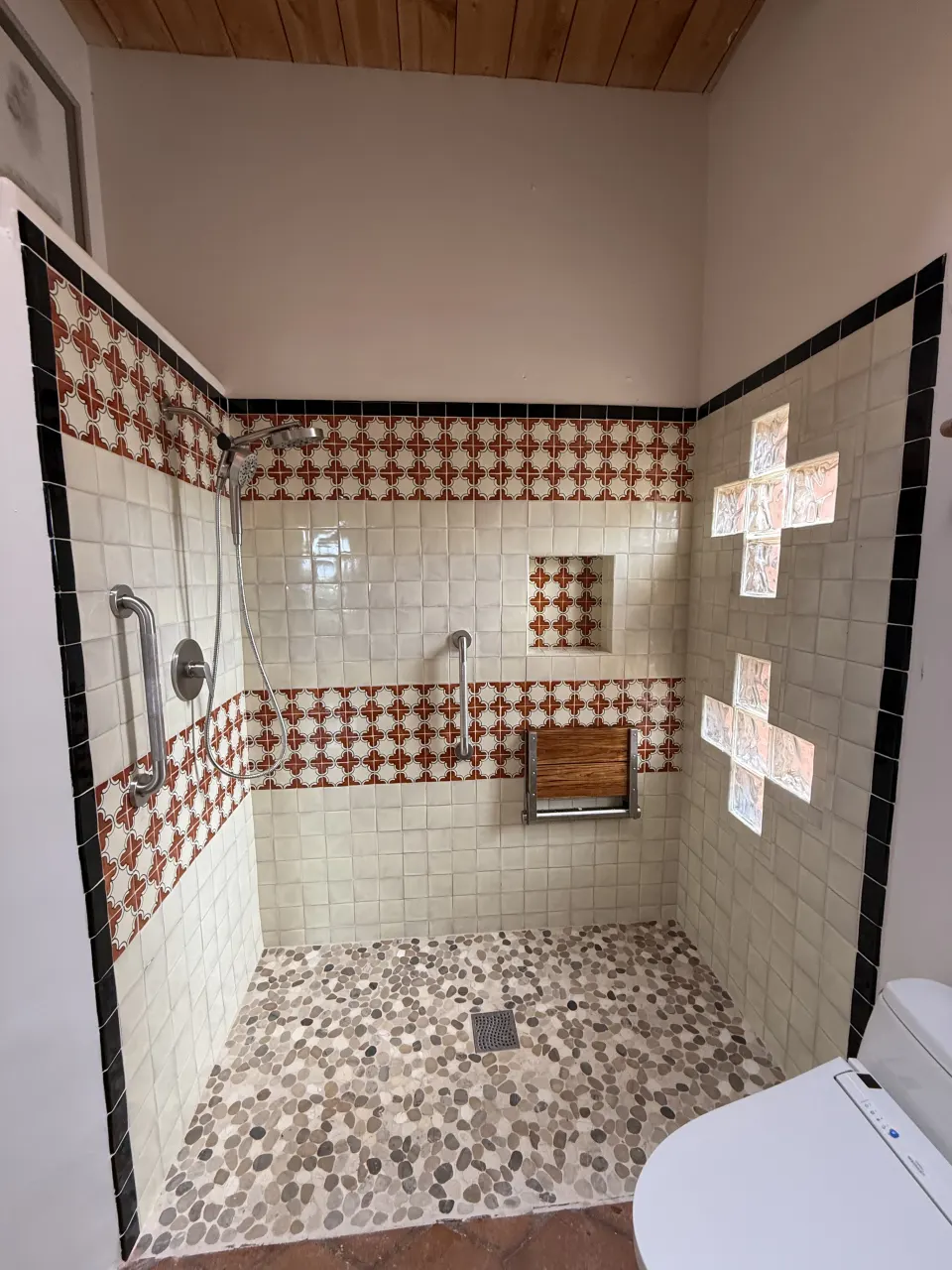 Tiled shower replacing bathtub